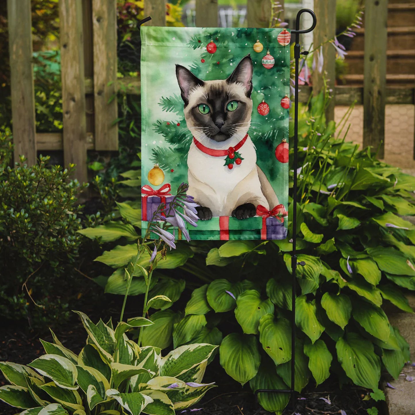 Caroline's Treasures Decorative Siamese Cat by the Christmas Tree Garden Flag